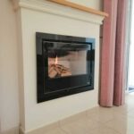 Carbel i70 Insert Fireplace Wood Burner - Polis Chrysochous with glass frame surround and thermic interior | ambioenergy.com